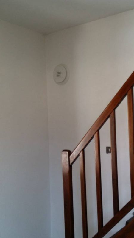 Piacentino & fils Pose bouche d’insufflation dans un salon